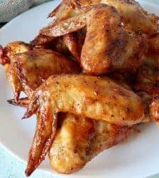 Tangy, sweet, spicy air fryer chicken wings with Gochujang make a delightful easy keto appetizer or meal. Make thee in your air fryer or oven and enjoy the finger-licking goodness.