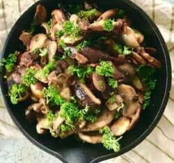 Three ingredients and ten minutes of cook time to make an amazing keto bacon mushroom side dish that is full of flavor. Such an easy way to a keto mushroom dish and so absolutely delicious.