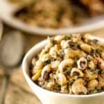 Instant Pot Kenyan Kunde is a nutritious recipe with black-eyed peas and peanuts in a white bowl sideways shot