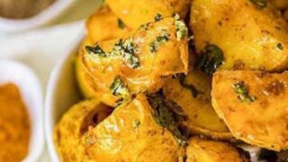 Amchoor Potatoes in a white bowl