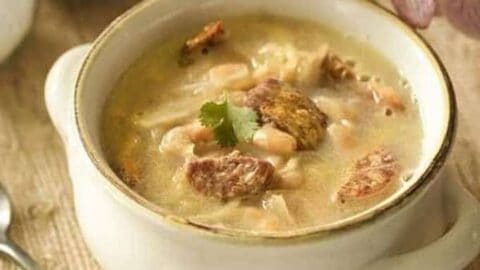 Sauerkraut soup in white bowl