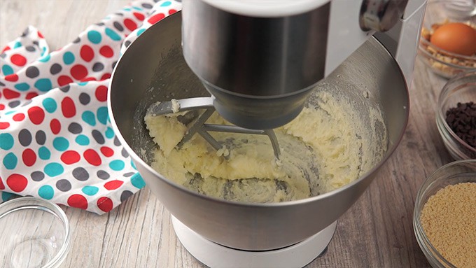 Side shot of mixing the butter and sugar together.