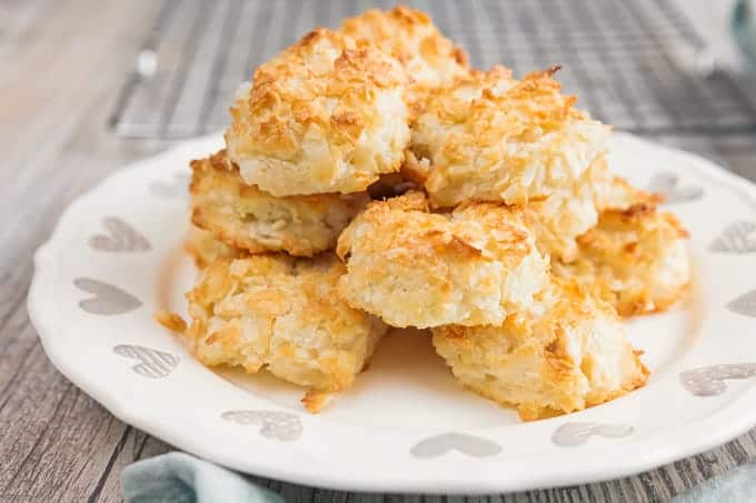 Keto Coconut Macaroons on a white platter with heart designs