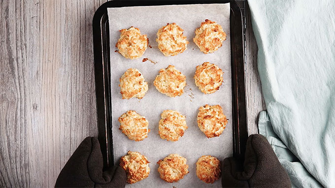 Keto Coconut Macaroons on a baking sheet with parchment paper