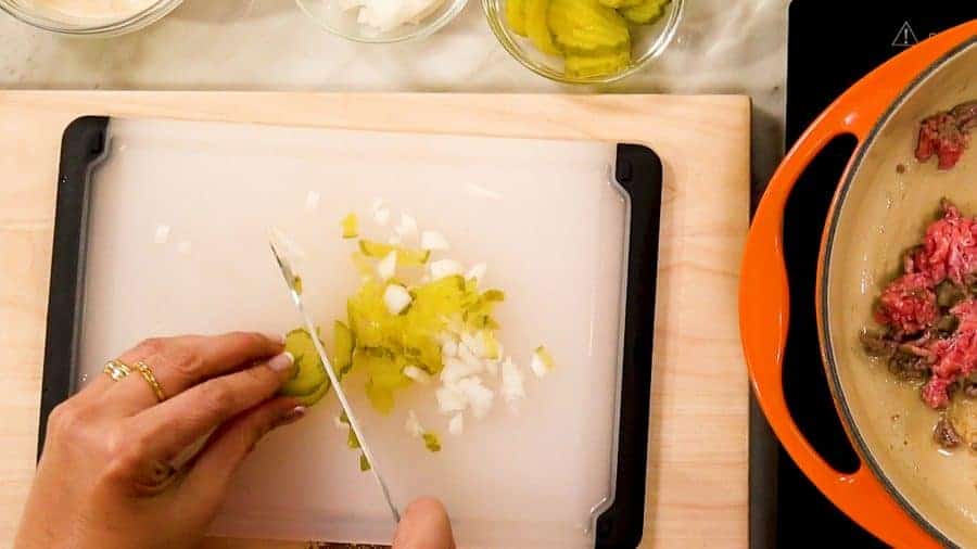 Overhead shot of chopping pickles