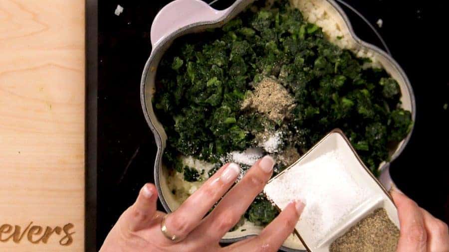 Adding spinach and seasoning
