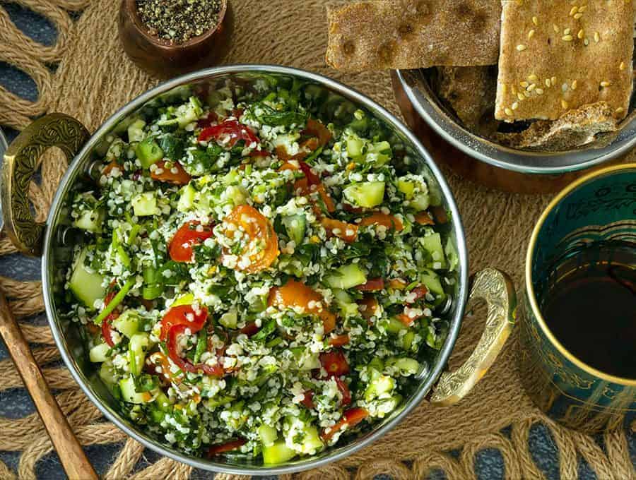 overhead shot of tabouli in  a round bowl