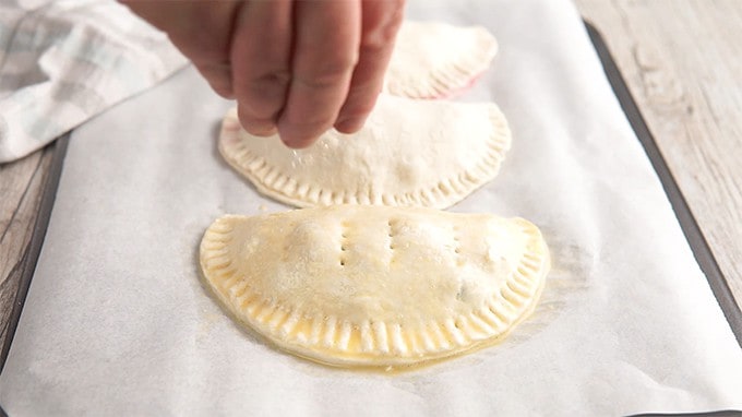 Sprinkled the tops of fruit hand pies with coarse sugar before baking in the air fryer. 