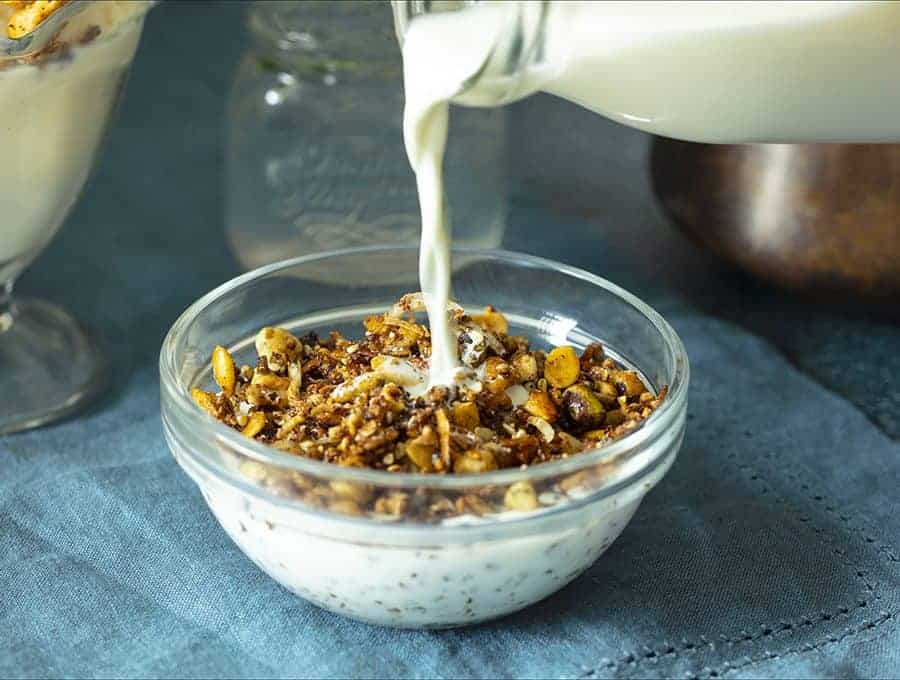 Keto Granola poured on a bowl of cereal