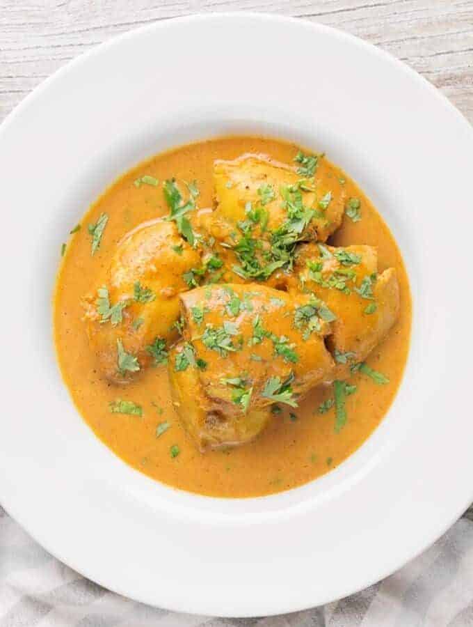 A bowl of Slow cooker Indian Butter Chicken.