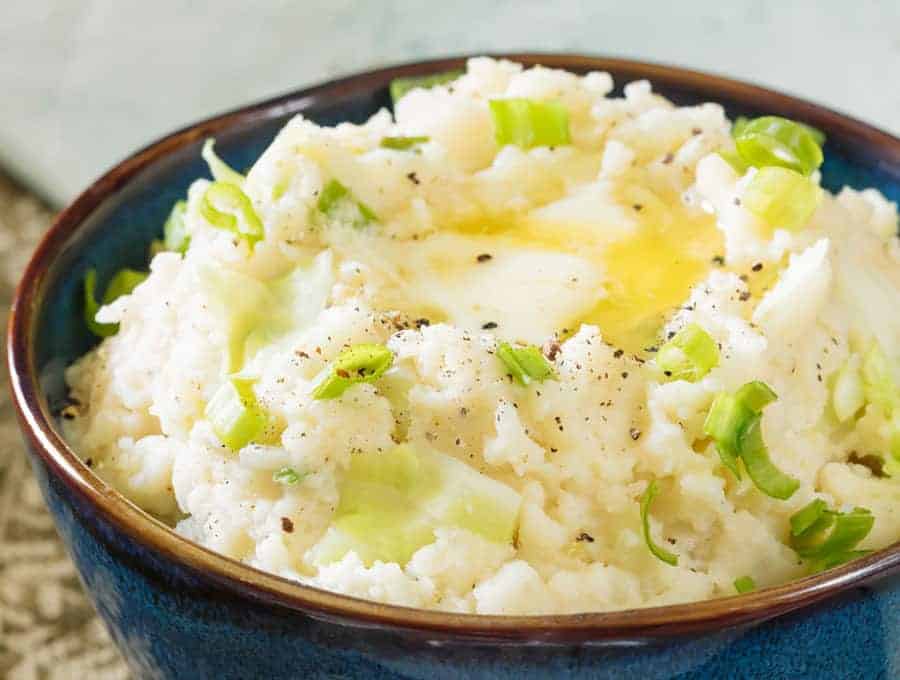 Instant Pot Mashed Potatoes with Cabbage with butter on top