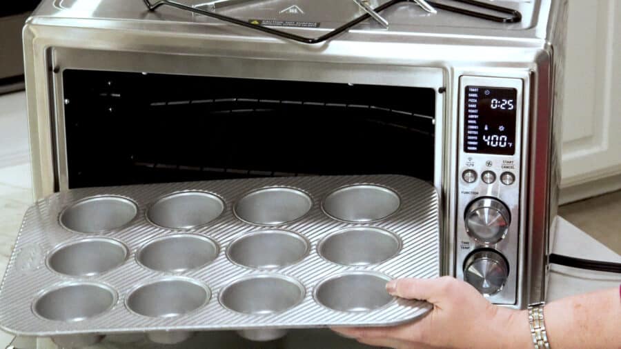 Side Shot Of My Usual Muffin Pan Being Placed In The Oven