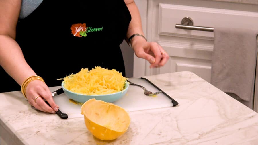 Side shot of the prepared spaghetti quash in a bowl.
