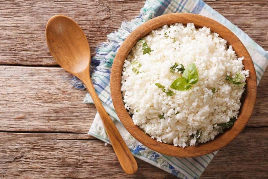 Cauliflower rice in a brown bowl