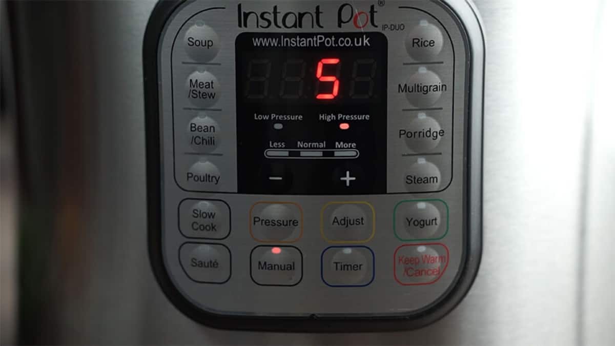 front of an instant pot display with the number 5 on the digital display