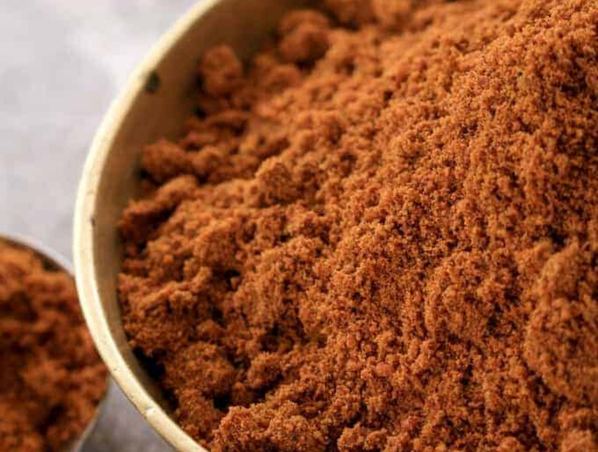 Close up shot of Baharat Spice Mix in a ceramic bowl. 