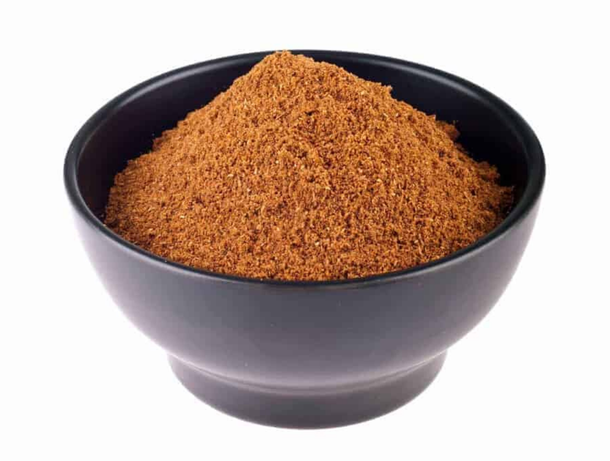 Lebanese 7 Spice Mix in a black bowl with a white background. 