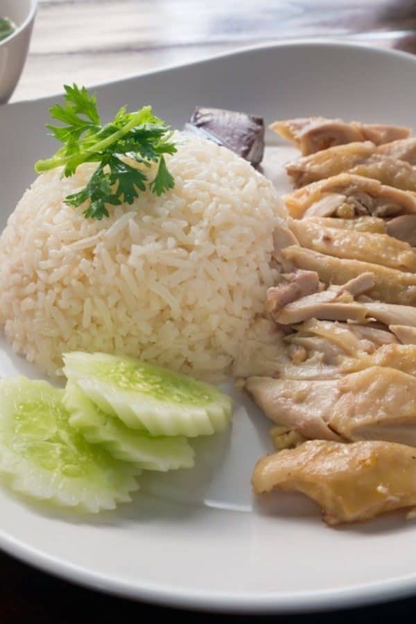 Hainanese Chicken and Rice on a white plate