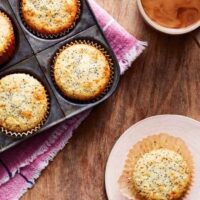 lemon poppyseed muffins in a muffin tin