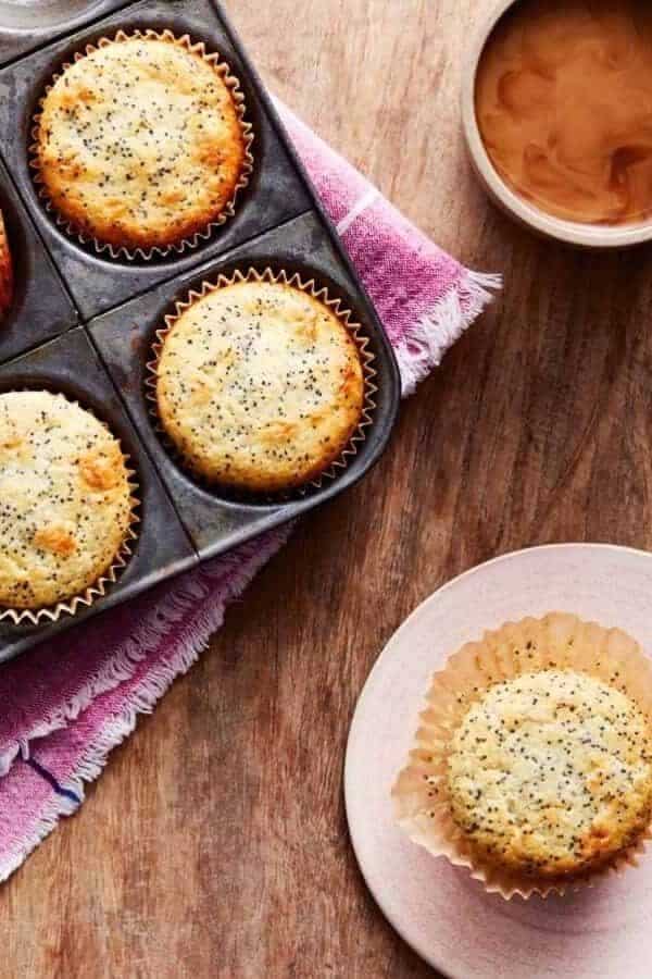 lemon poppyseed muffins in a muffin tin