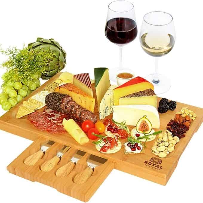 charcuterie board with serving utencils