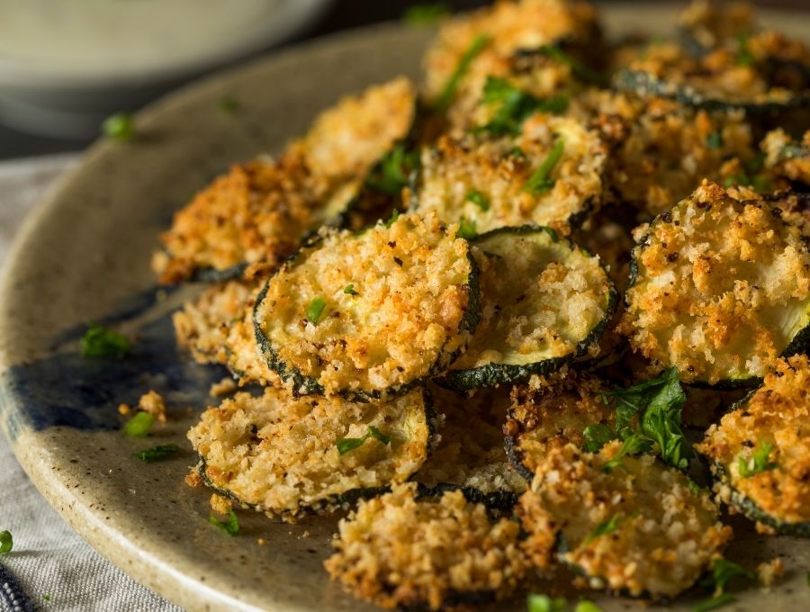 AIr Fryer Zucchini on an earth tone plate