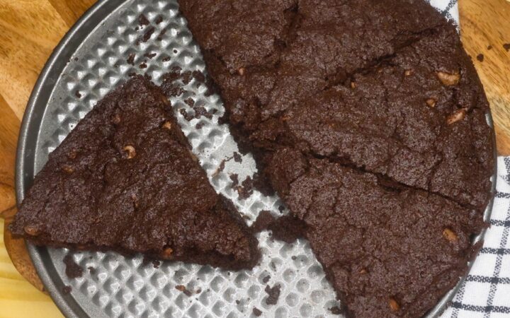 Air Fryer Brownies on the base of a springform pan cut into slices