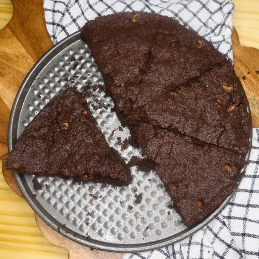 Air Fryer Brownies on the base of a springform pan cut into slices