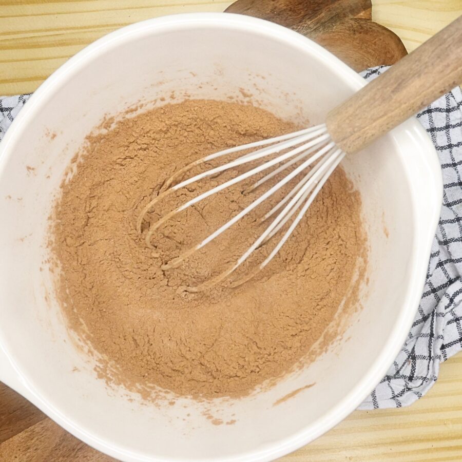 Dry ingredients for air fryer brownies in a mixing bowl
