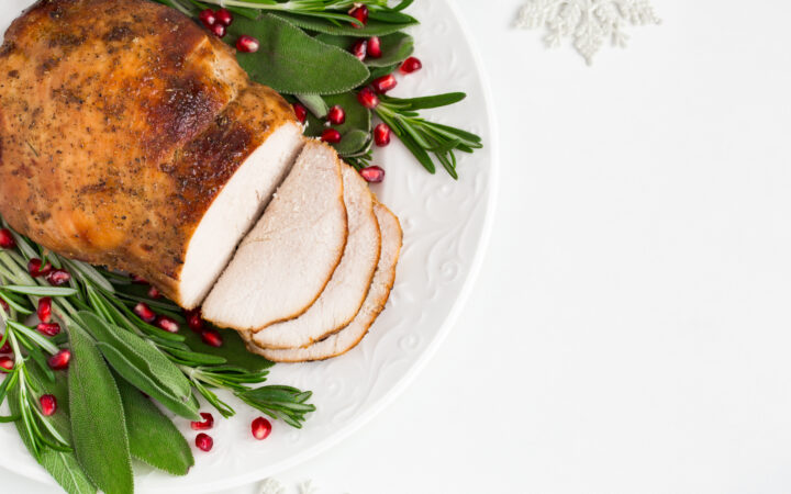 turkey breast with cranberry garnish