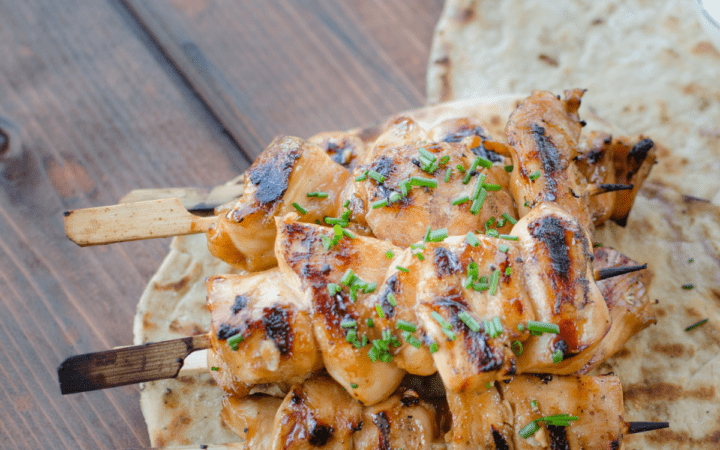 AIr Fried Chicken Tenderloins served on skewers with naan