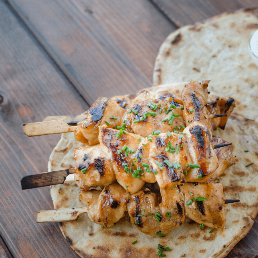 AIr Fried Chicken Tenderloins served on skewers with naan