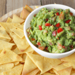 Keto Chips on a serving dish with guacamole