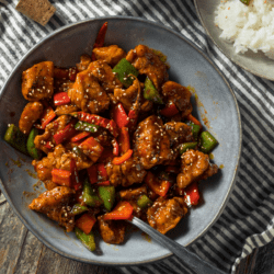 Szechuan Chicken in a cobalt bowl
