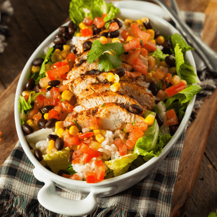 Overhead view of a Copycat Chipotle Burrito Bowl in a white pan