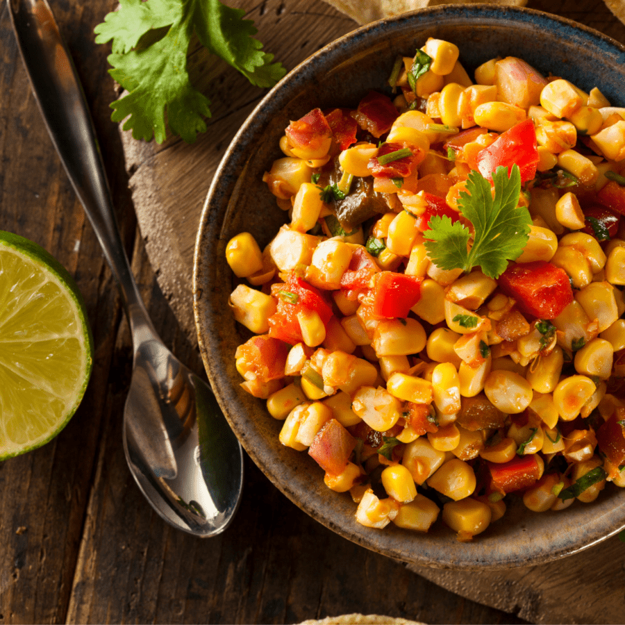 Overhead image of corn salsa in a bowl