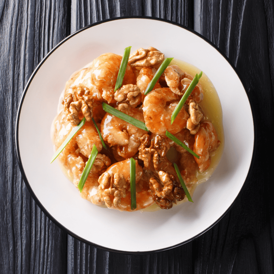 Overhead image of honey walnut shrimp on a plate