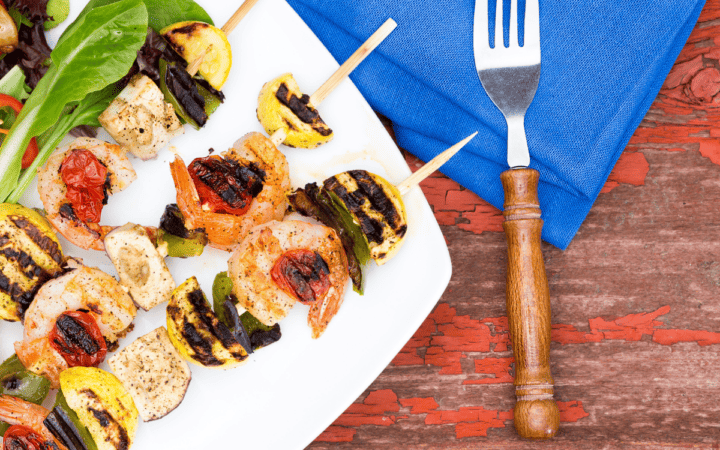 Grilled Shrimp Kabobs on a white plate