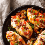 Close up of Monterey Chiken on a black plate - 9