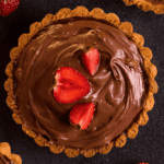 Overhead image of chocolate pudding pie with strawberry garnish