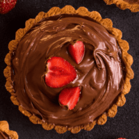 Overhead image of chocolate pudding pie with strawberry garnish