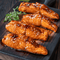 Honey Glazed Salmon on a cutting board