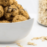 Close up image of peanut butter balls in a white bowl - 8