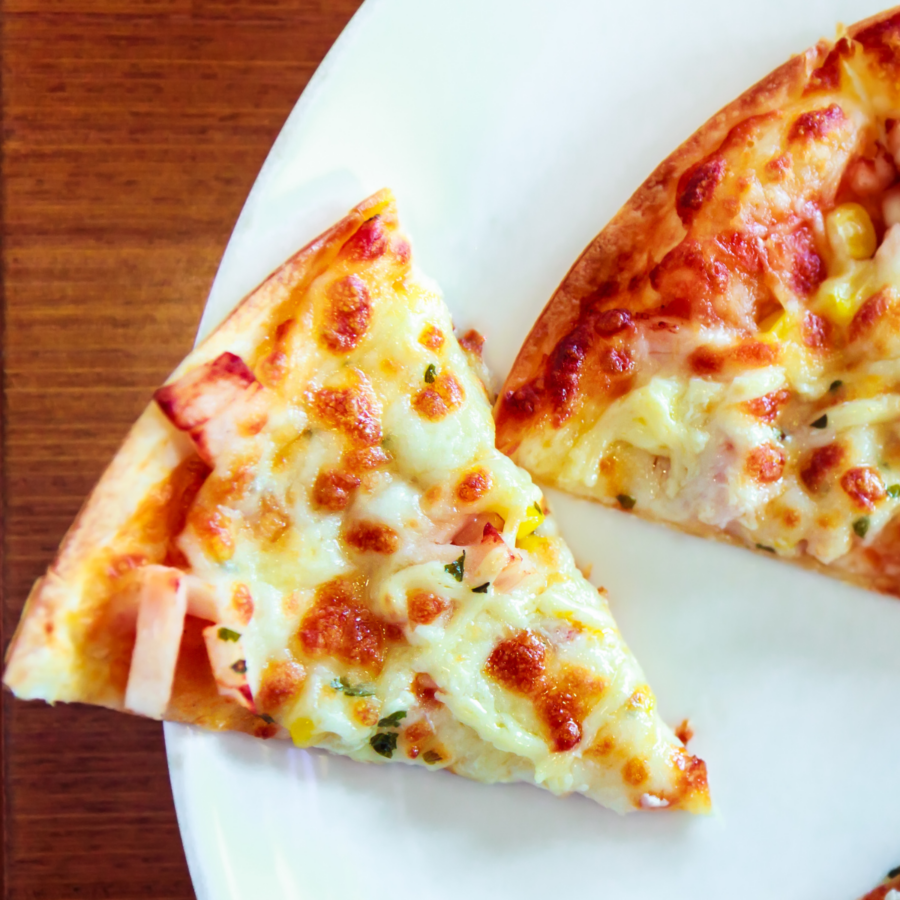 Close up image of a slice of Hawaiian Tortilla Pizza