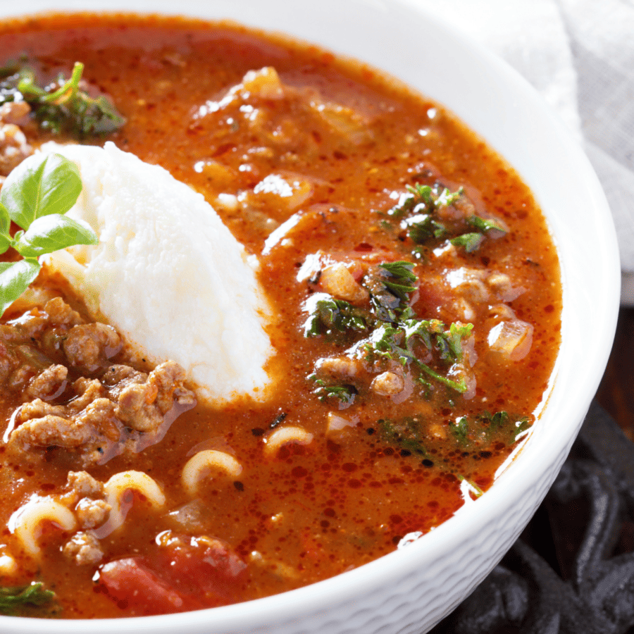 Close up image of Instant Pot Lasagna Soup in a white bowl