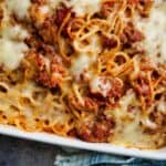 Close up image of baked spaghetti in a baking dish - 7