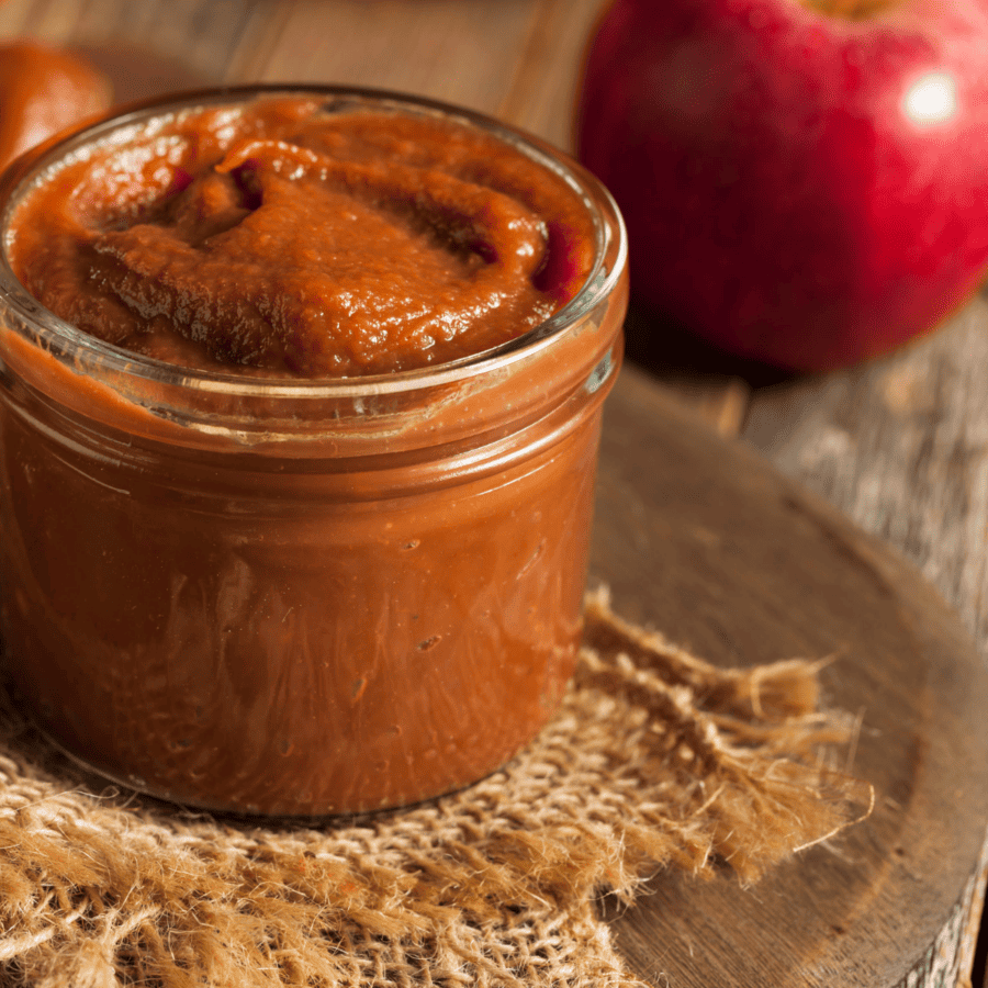 Close Up shot of Instant Pot Apple Butter in a mason jar