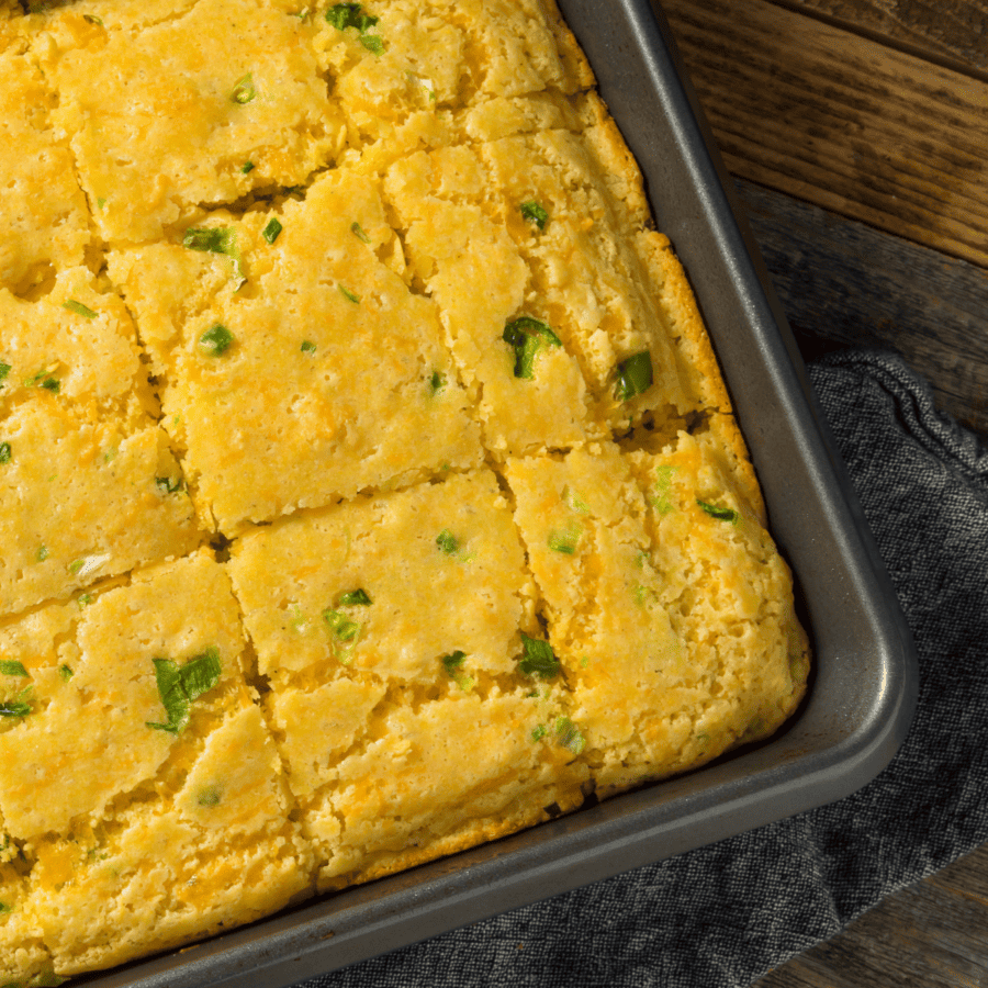 Close up shot of Mexican Cornbread in a metal pan