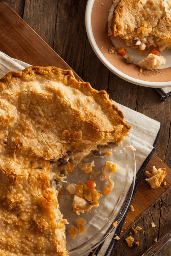 Overhead image of Turkey Pot Pie with a serving cut out of it