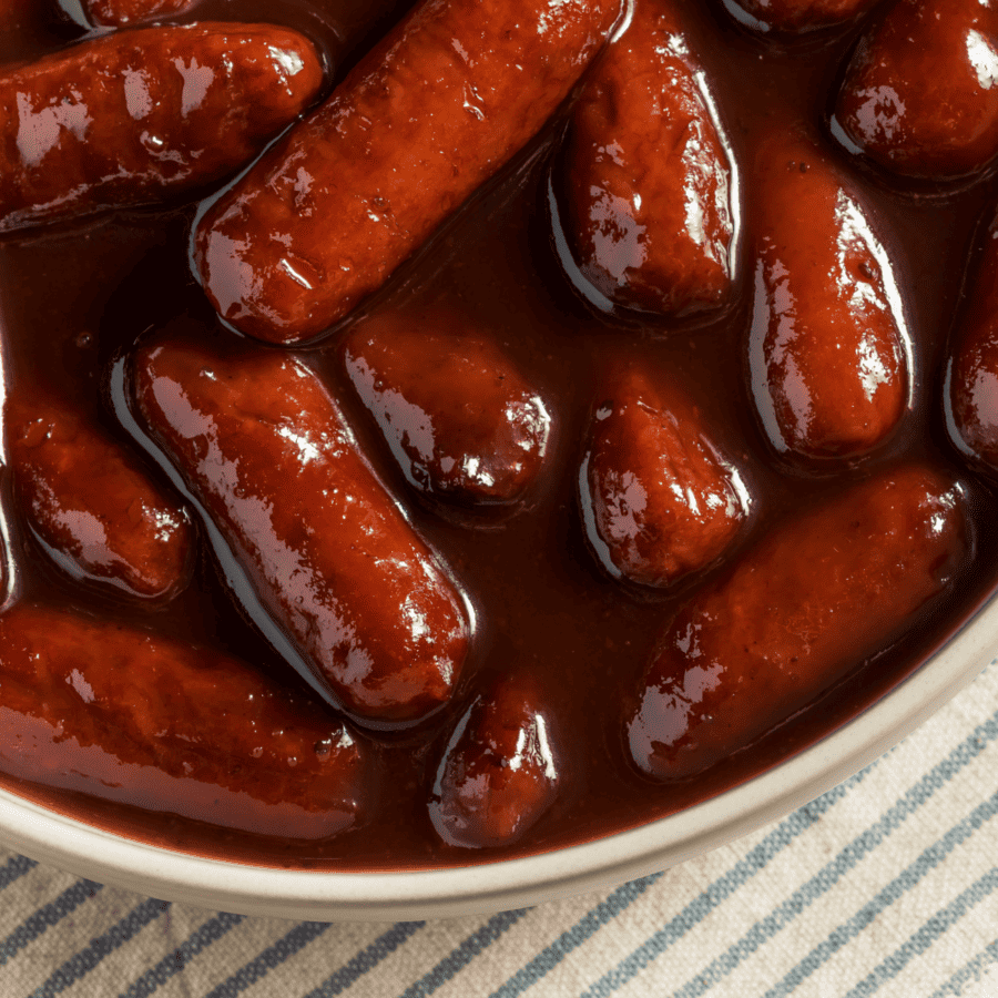 Close up image of little smokies in sauce
